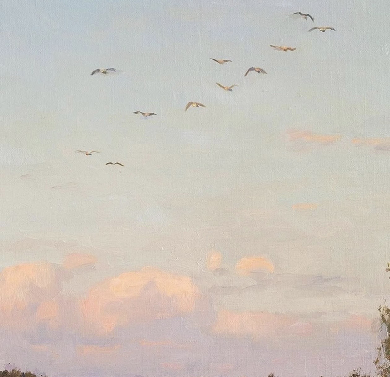 Dreamy sky with birds in soft pastel light
